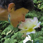 Christina Nienabar-Roberts smelling a lotus